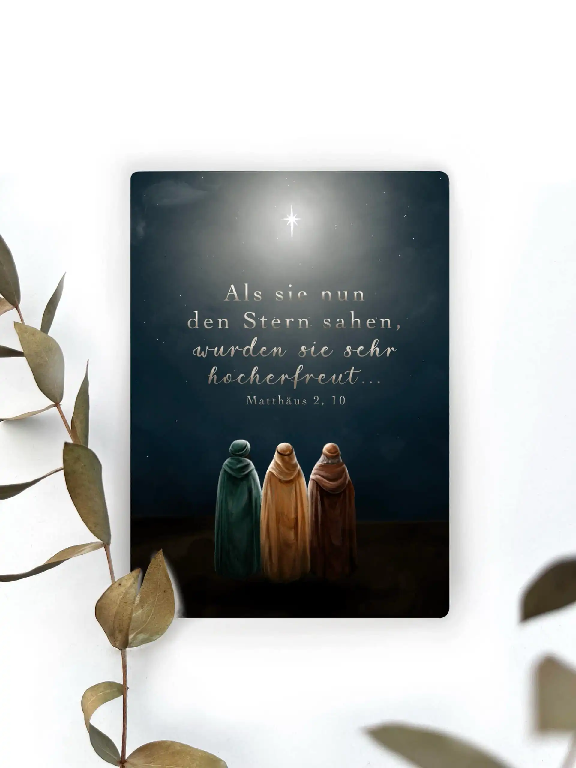 Sternenbild mit Weihnachtsszene und biblischem Zitat.