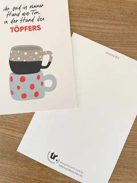Inhalt der Karte mit Tassenillustration und christlichem Text, Fokus auf christliche Marken, Gebet,.