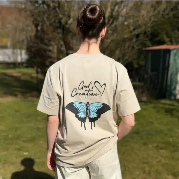 God's Schöpfung T-Shirt mit Schmetterlings-Design und Herzmotiv, christliche Mode.